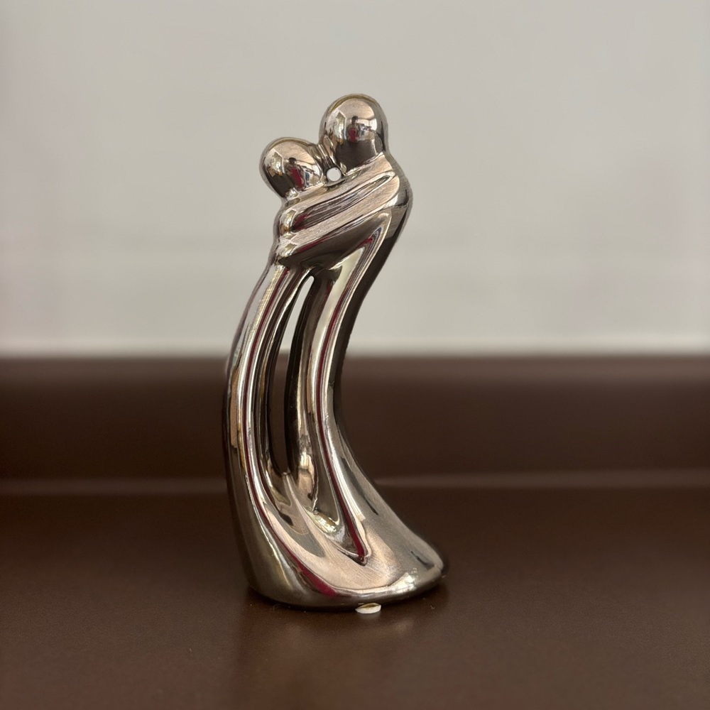 Elegant Silver Embrace Sculpture - Picture 3 of 6